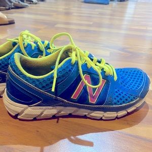 New Balance tennis shoes.